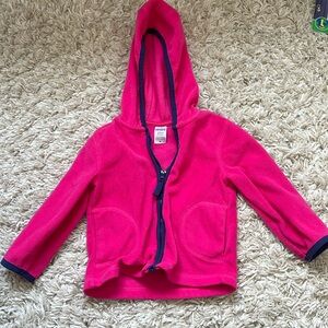 Carters girl 18 month fleece zip up. Pink and navy blue.